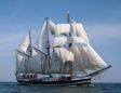 Schooner at sea with all sails set