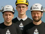 AI generated picture of three men looking at the camara